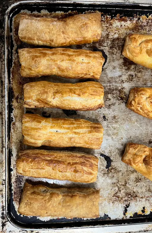 Freshly baked golden sausage rolls